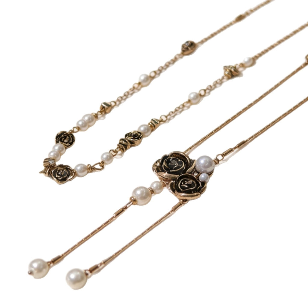 Collana vintage a doppio strato con nappe di perle e rosa