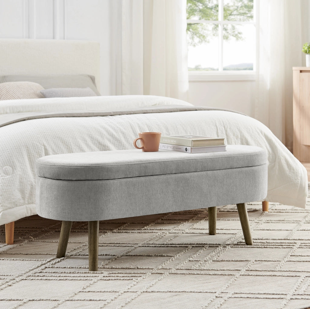 Panca contenitore ovale 110x40x42 cm in tessuto chenille grigio con struttura in legno massello