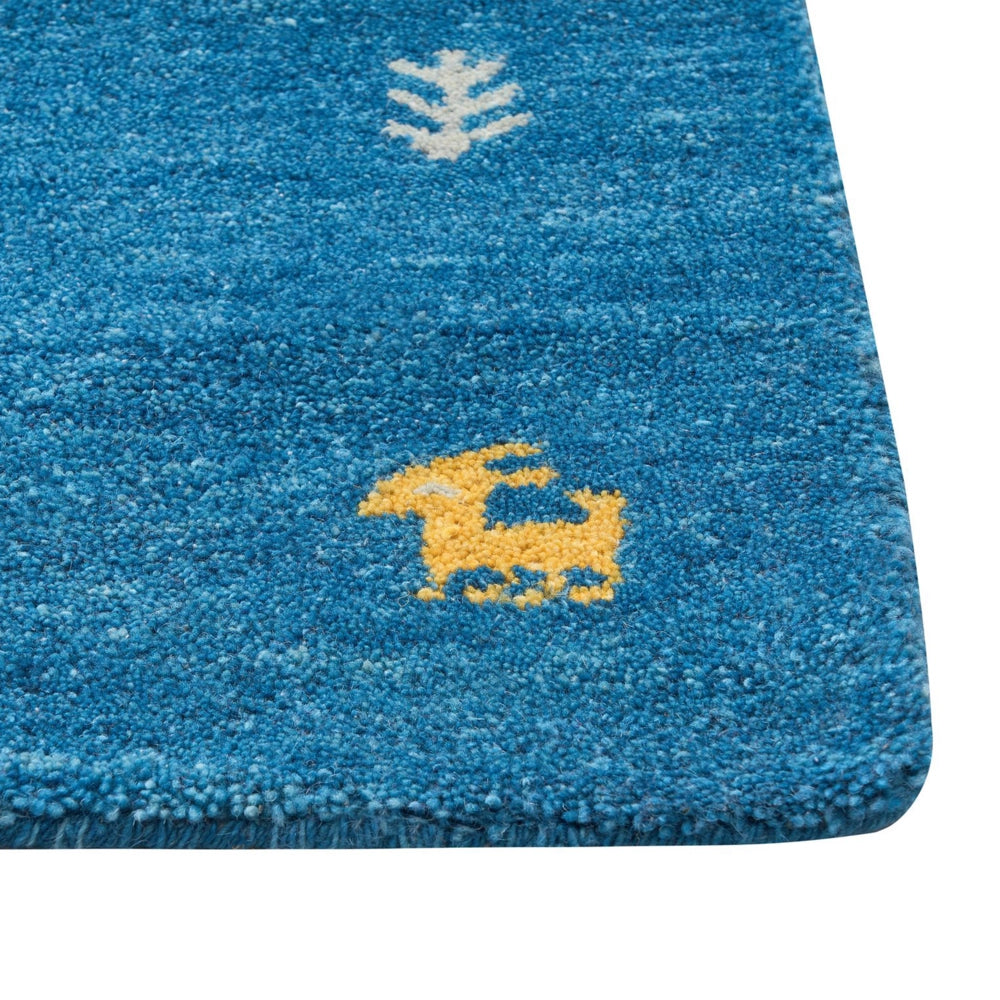 Tappeto Gabbeh in lana blu 140 x 200 cm, trapuntato a mano con motivi animali occidentali e design rustico