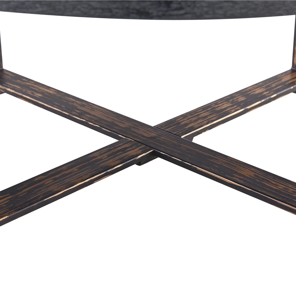 Tavolino rotondo da salotto 68 cm in stile industriale vintage, piano MDF nero effetto legno e base in metallo