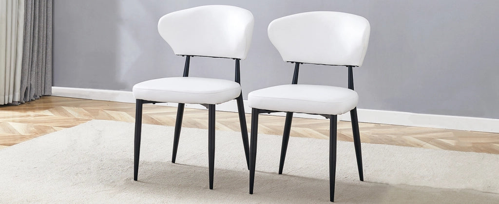 Sedia da pranzo ergonomica minimalista bianca con schienale curvo, dal design confortevole, che apre la strada a una nuova postura di seduta all'inseg