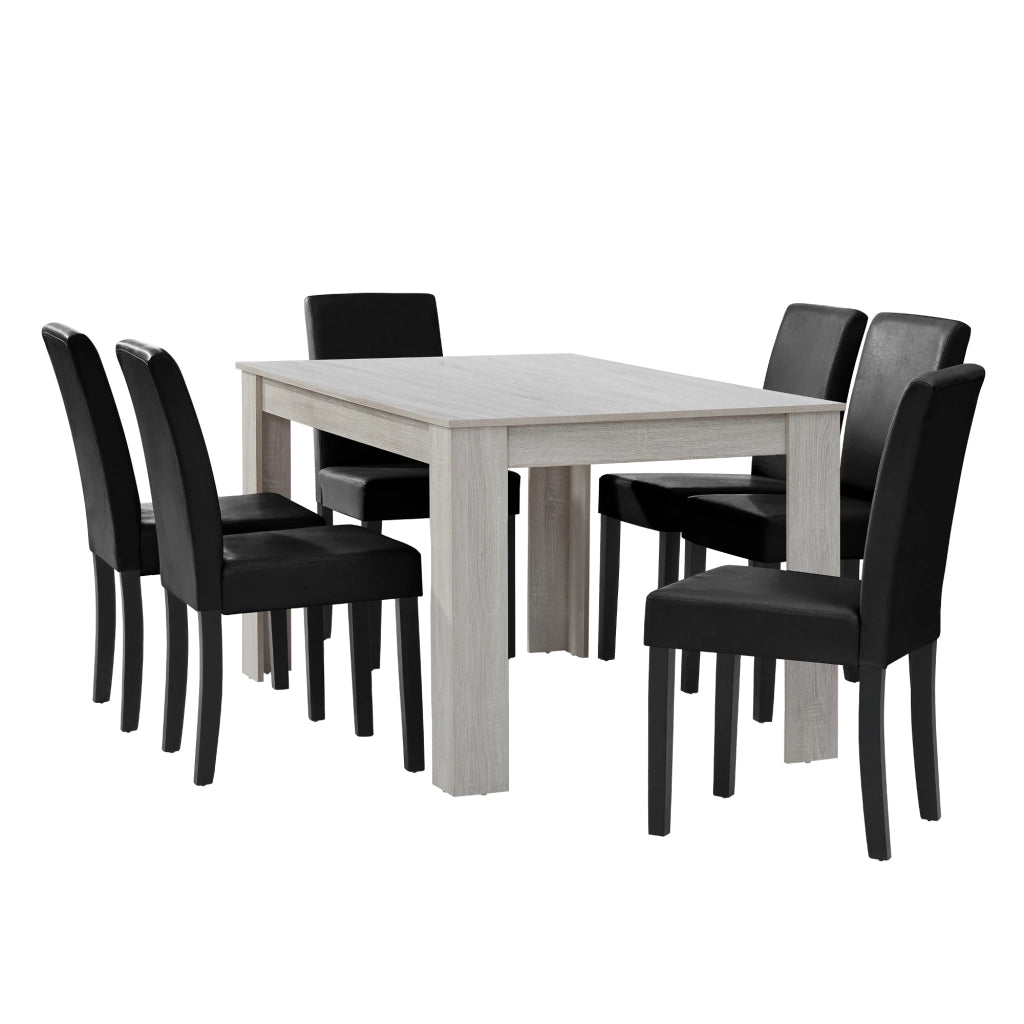 Set Pranzo con Tavolo 140x90 cm e 6 Sedie in Similpelle - Effetto Rovere Bianco / Nero [en.casa]