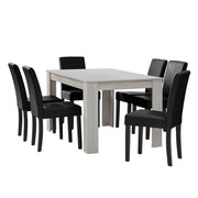 Set Pranzo con Tavolo 140x90 cm e 6 Sedie in Similpelle - Effetto Rovere Bianco / Nero [en.casa]