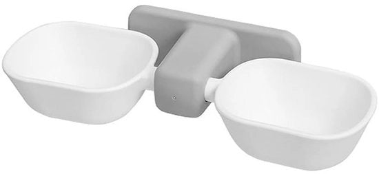 Catino alimentatore per gatti con design ergonomico, regolabile e rimovibile, facile da pulire, installato a muro.