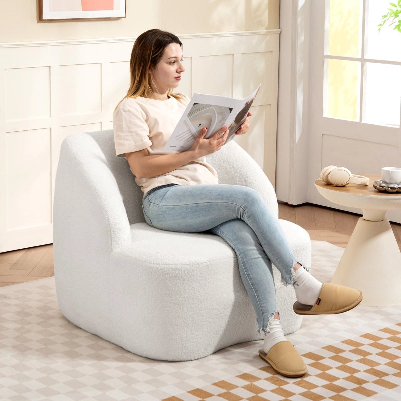 Poltrona imbottita moderna in poliestere color crema, seduta compatta con schienale alto e base antiscivolo