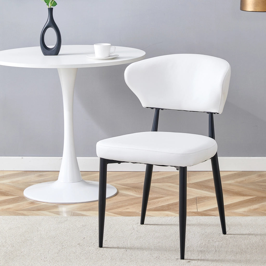 Sedia da pranzo ergonomica minimalista bianca con schienale curvo, dal design confortevole, che apre la strada a una nuova postura di seduta all'inseg