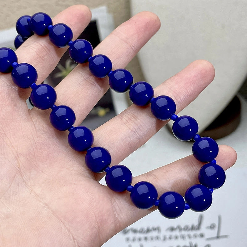Collana di perline blu scuro