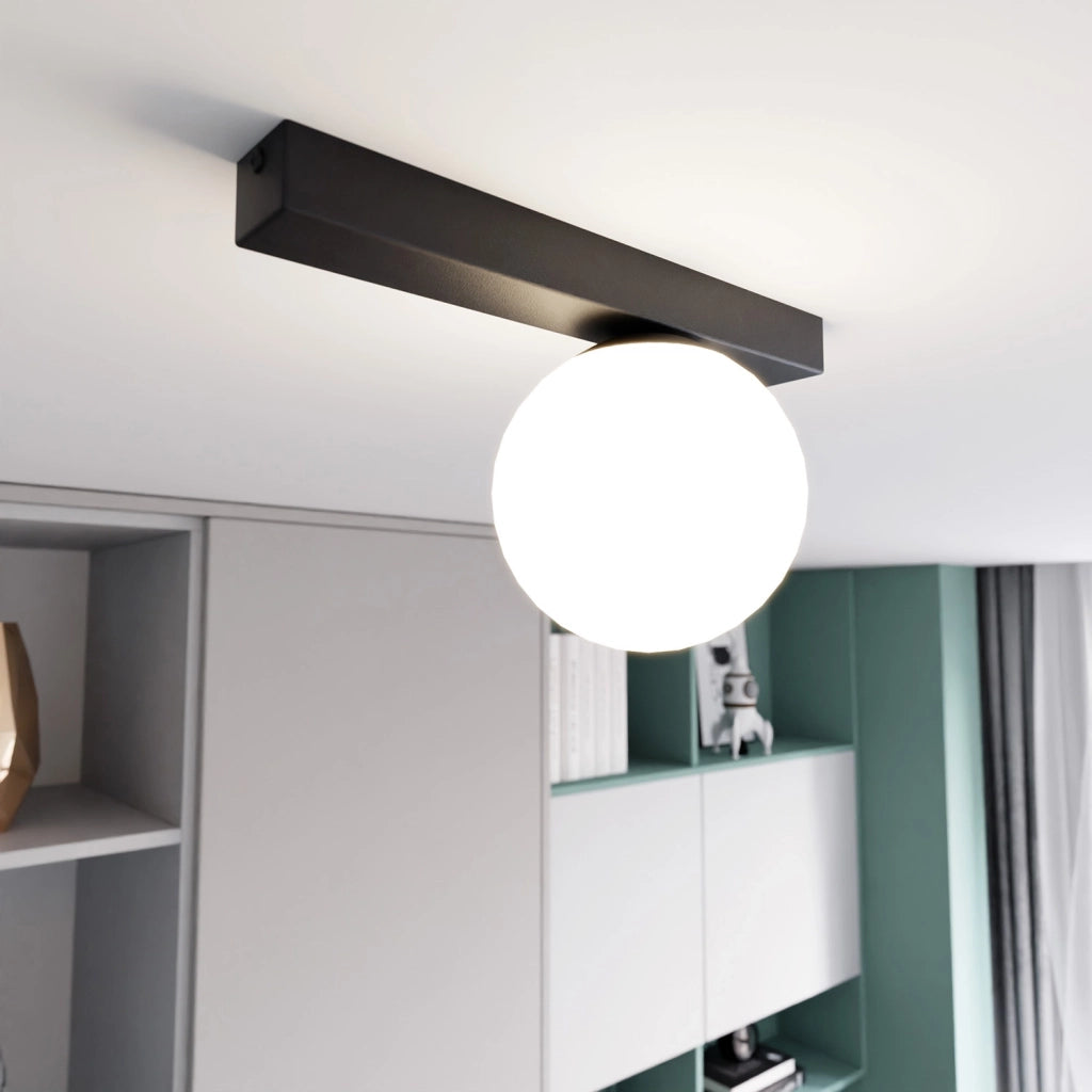 Plafoniera Moderna 1 Luce Giapeto Barra In Acciaio Nero E Sfera Di Vetro Opale