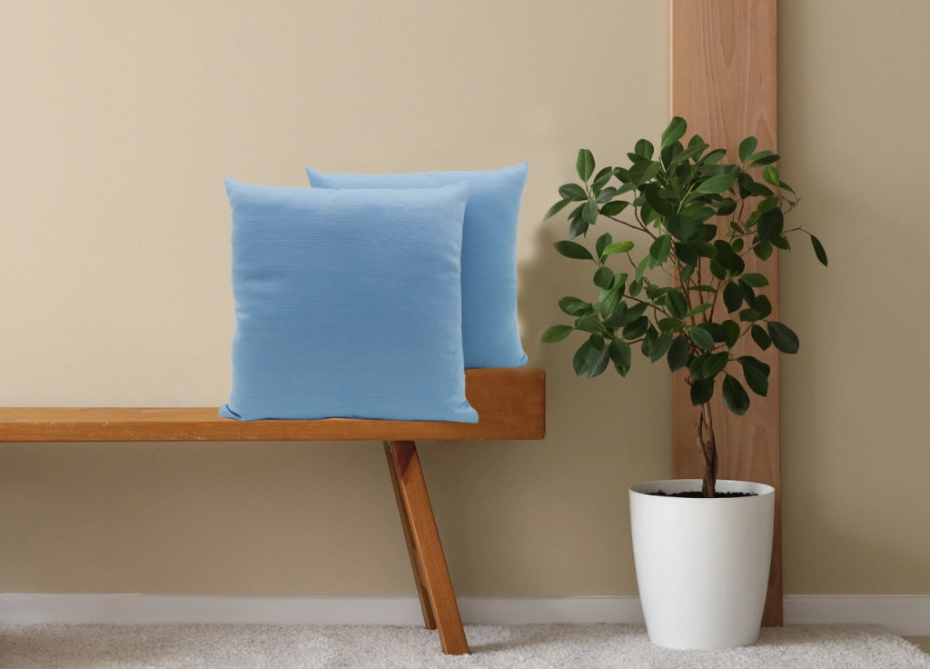 Coppia Cuscini Arredo Imbottiti Tessuto Ottoman In Tinta Unita Colore Azzurro 31 - 60x60 - Azzurro 31