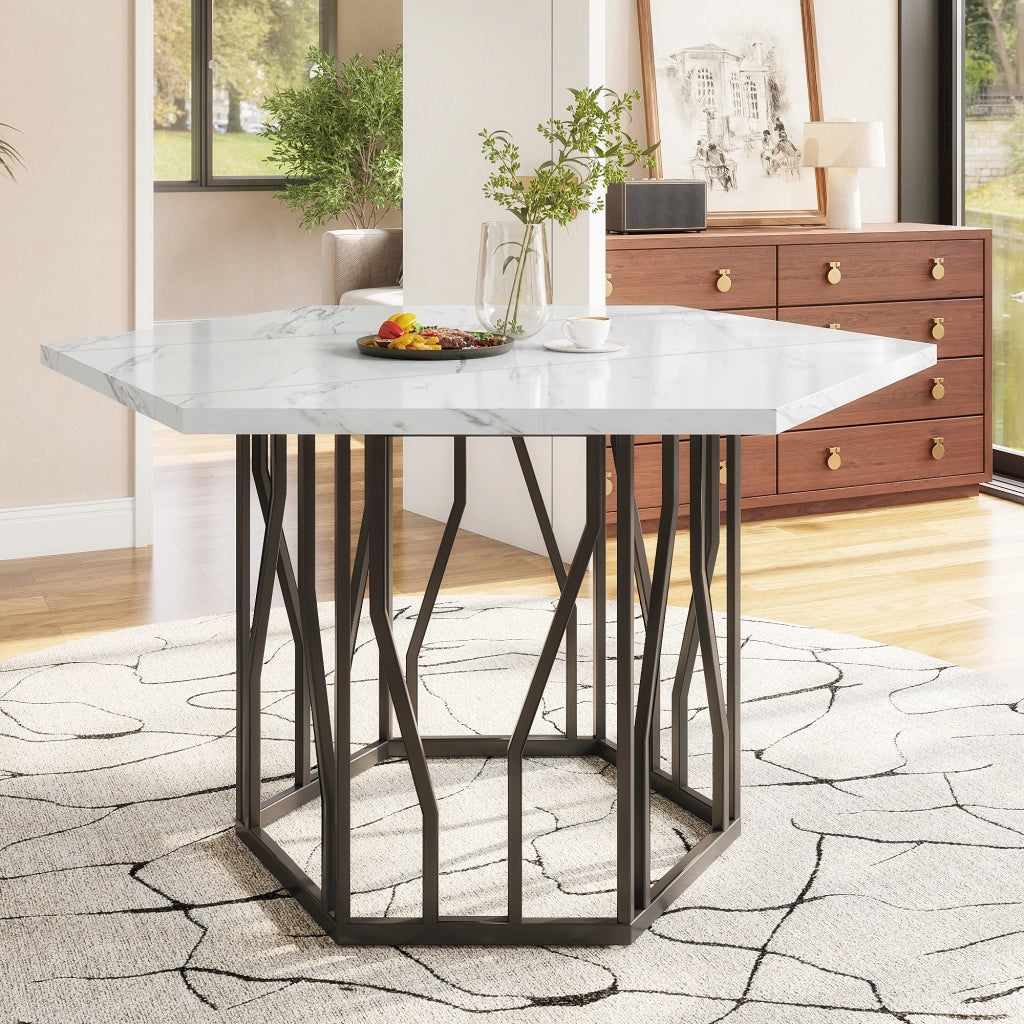 Tavolo da pranzo moderno esagonale con piano effetto marmo e base in metallo nero