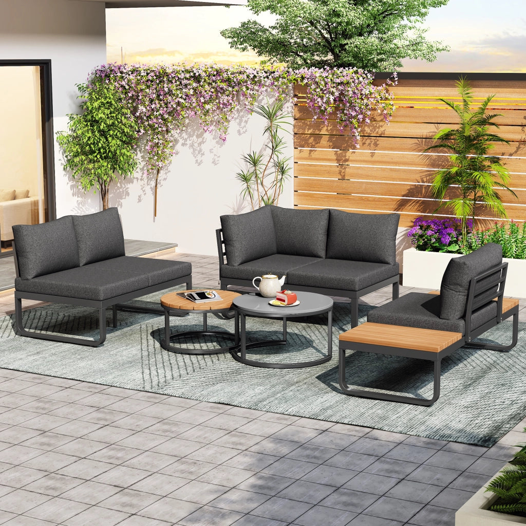Set lounge da giardino 5 posti con 2 tavolini impilabili in ferro grigio con cuscini inclusi