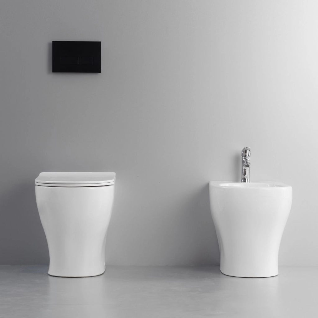 Coppia sanitari fun a pavimento vaso e bidet sedile frizionato