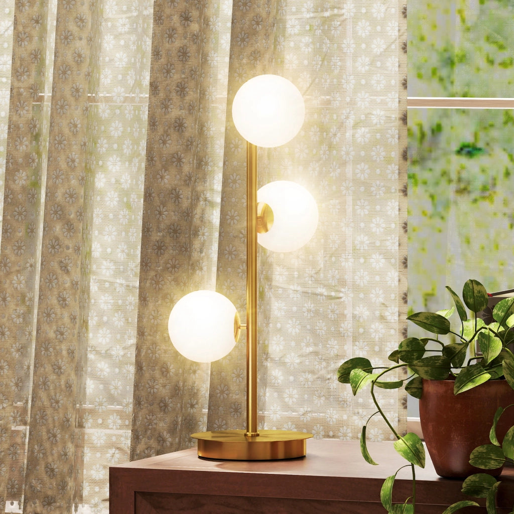 Lampada da tavolo con 3 sfere in vetro ¨C Xylo ¨C Base acciaio ottone 24x24x53cm