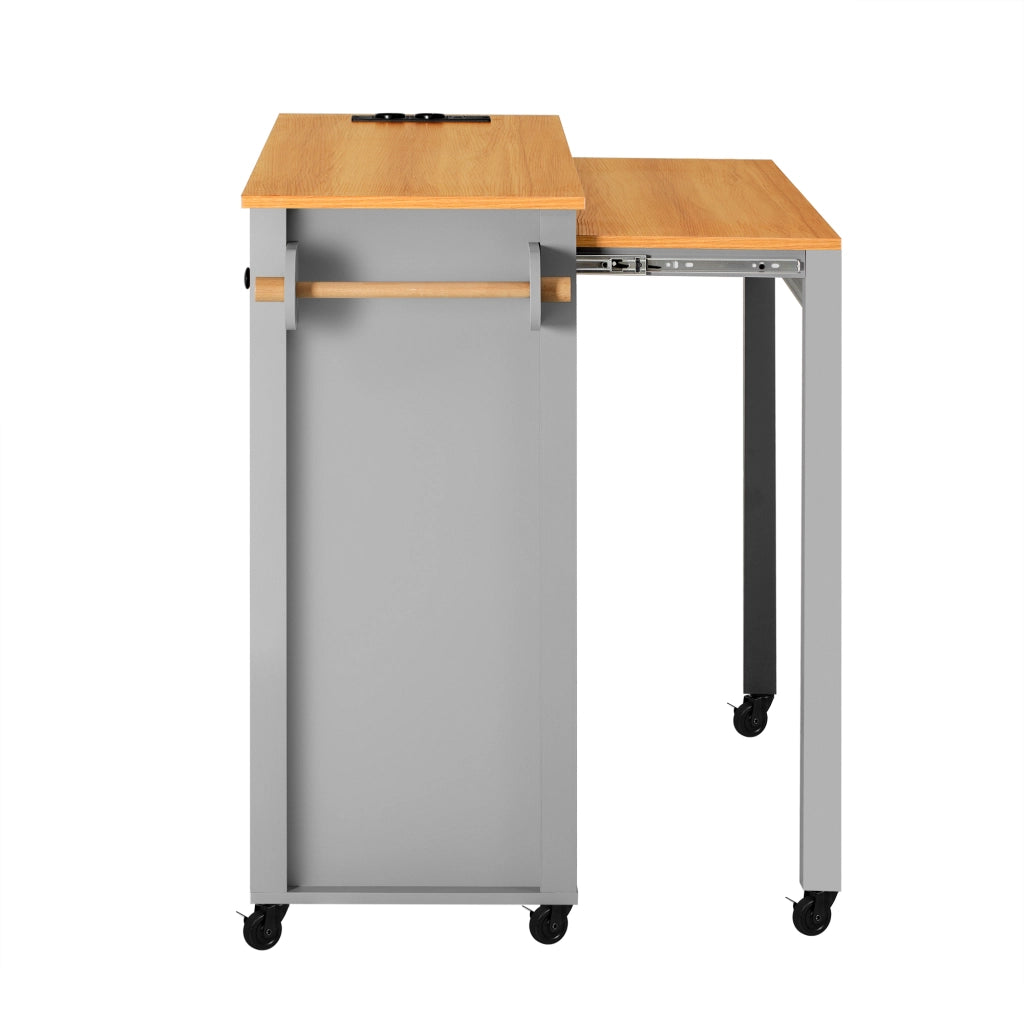 Isola Cucina Mobile con Ruote e Piano Estensibile 120×40-75 cm; Vano Porta Rifiuti; Prese AC/USB-C e Spazio Contenitore Grigio