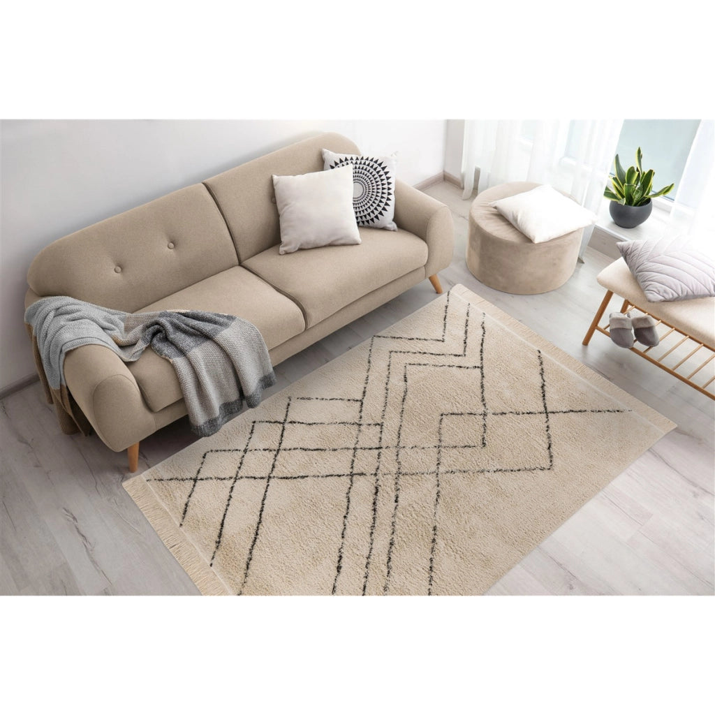 Tappeto Mylen in cotone crema e nero con frange