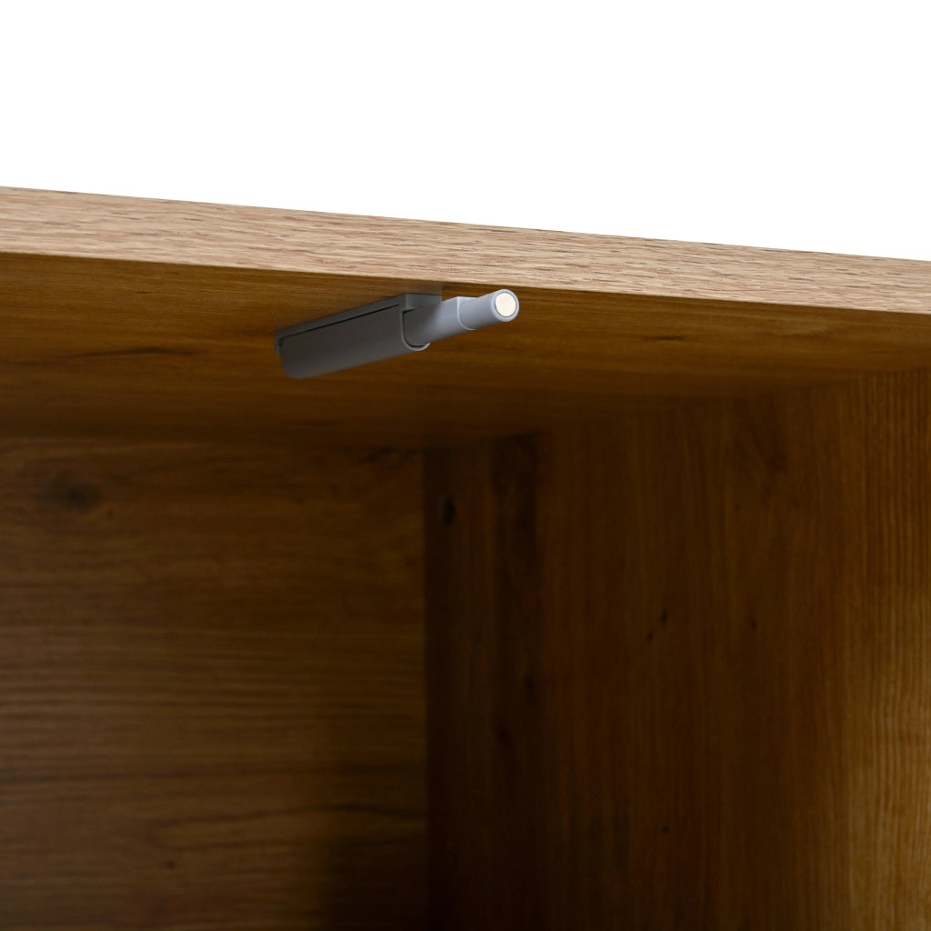 Tavolino da caffè ovale in MDF effetto legno naturale con ante in rattan e gambe in metallo nero, con vano contenitore