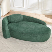 Divano compatto in Teddy verde con design arrotondato, cuscino di supporto e imbottitura elastica