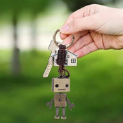 Hanger a forma di robot in cavo di corda intrecciata in pelle - decorazione ornamentale per la chiave.