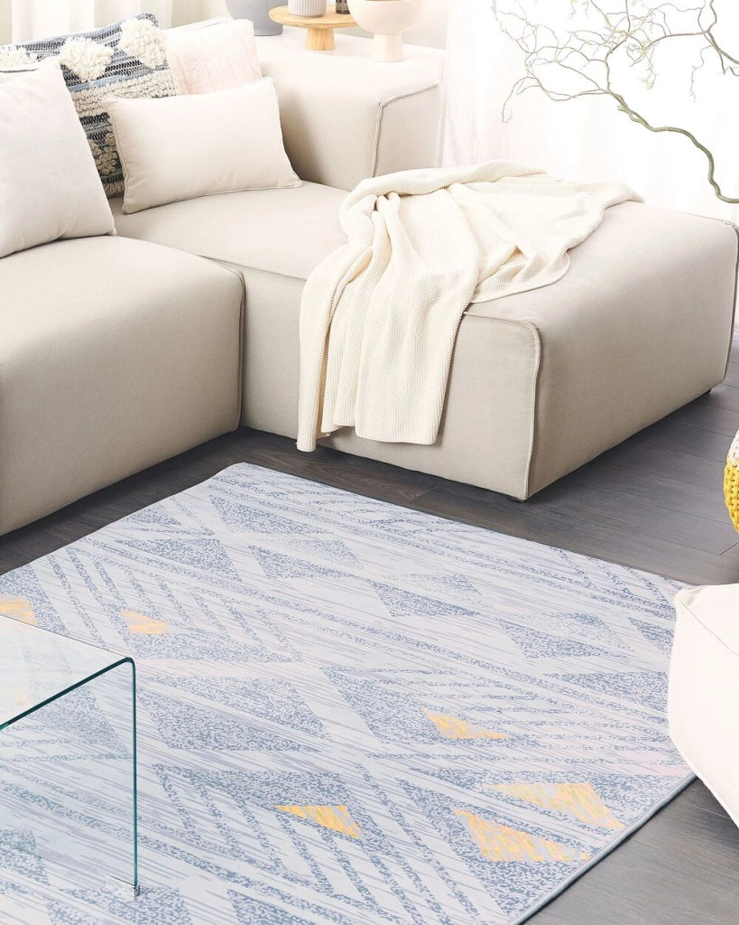 Tappeto grigio con motivo geometrico a pelo corto in poliestere giallo 140 x 200 cm