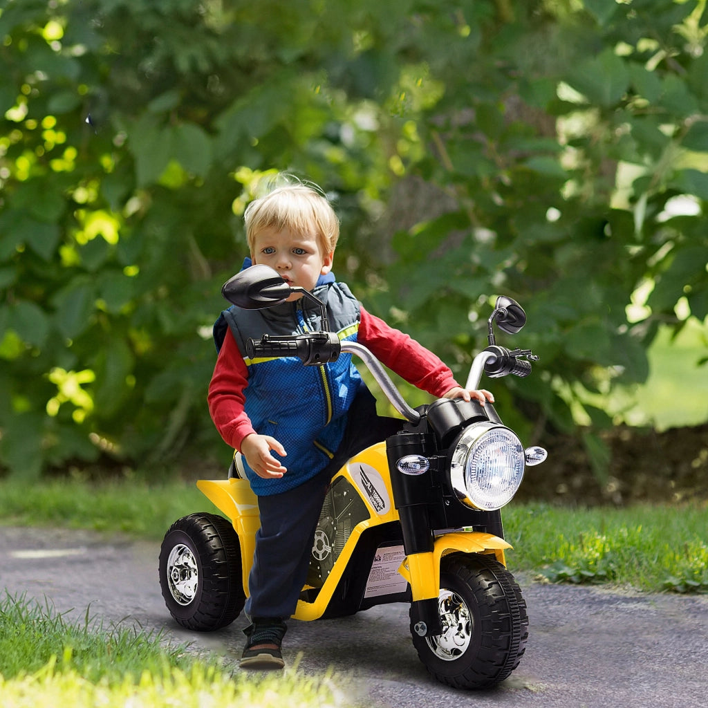 Moto Elettrica per Bambini a 3 Ruote con Luci e Suoni, Batteria Ricaricabile 6V, Velocit¨¤ 2 km/h, per Bimbi da 18-36 Mesi, 72cmx57cmx56cm Gialla