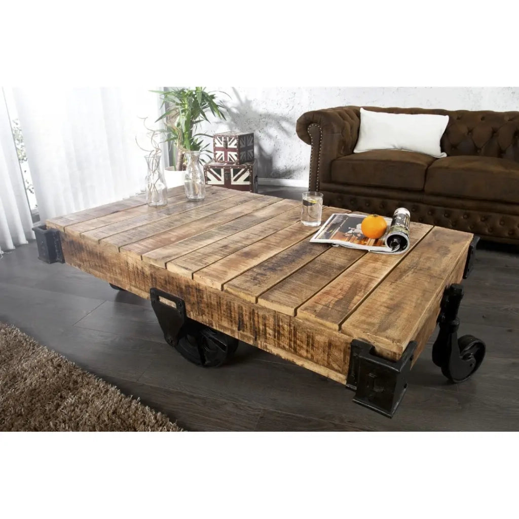 Tavolino basso RAIL industriale su ruote 110 cm – Legno di mango massiccio e metallo