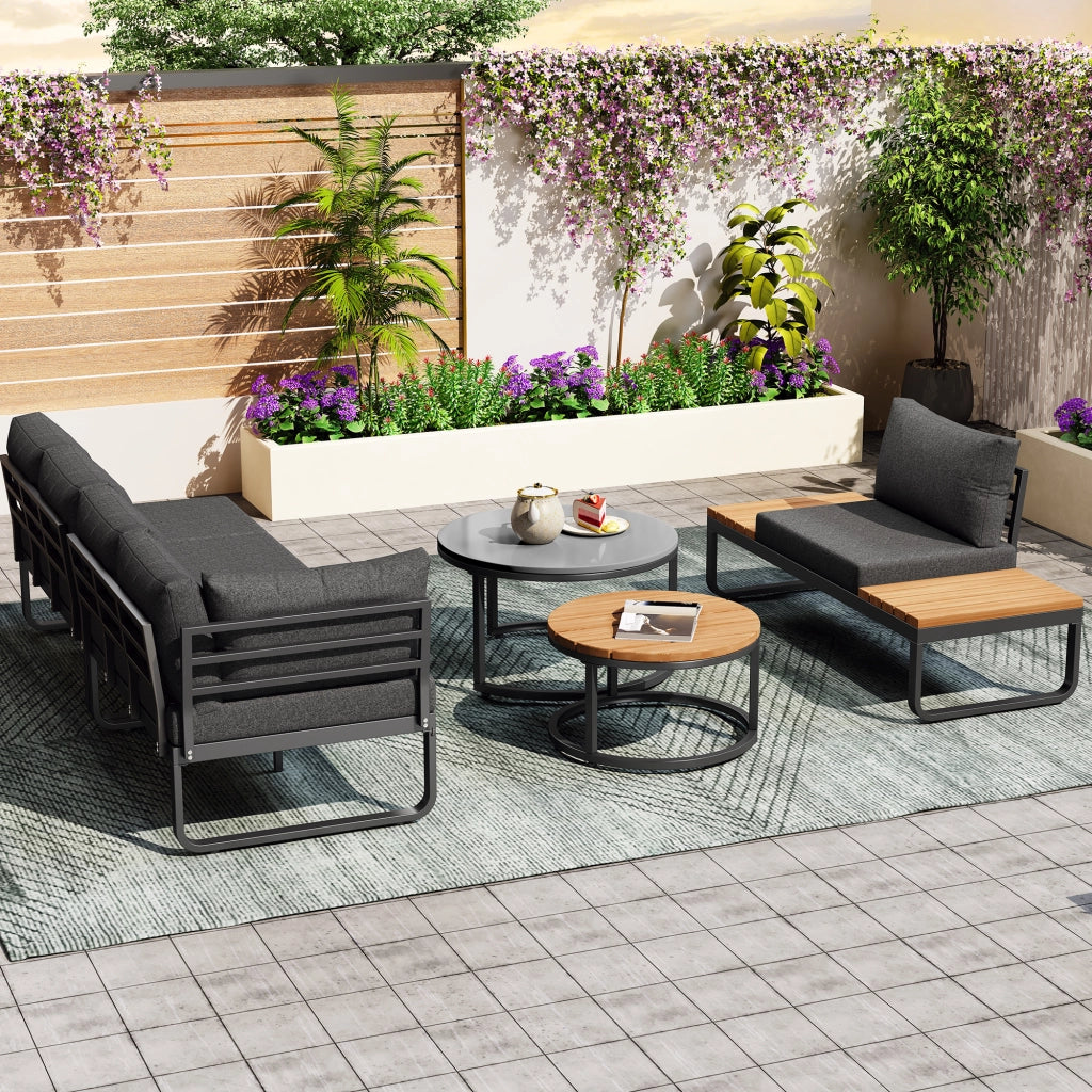 Set mobili giardino 4-5 persone: 2 tavolini impilabili; ferro zincato; cuscini seduta; piedini regolabili; grigio