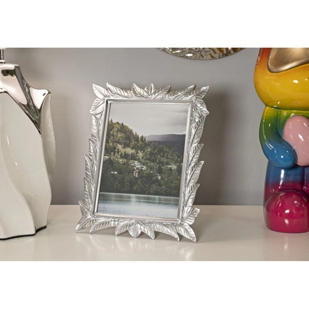 Cornice portafoto Leavy argento con decoro a foglie scolpite 15x20 cm