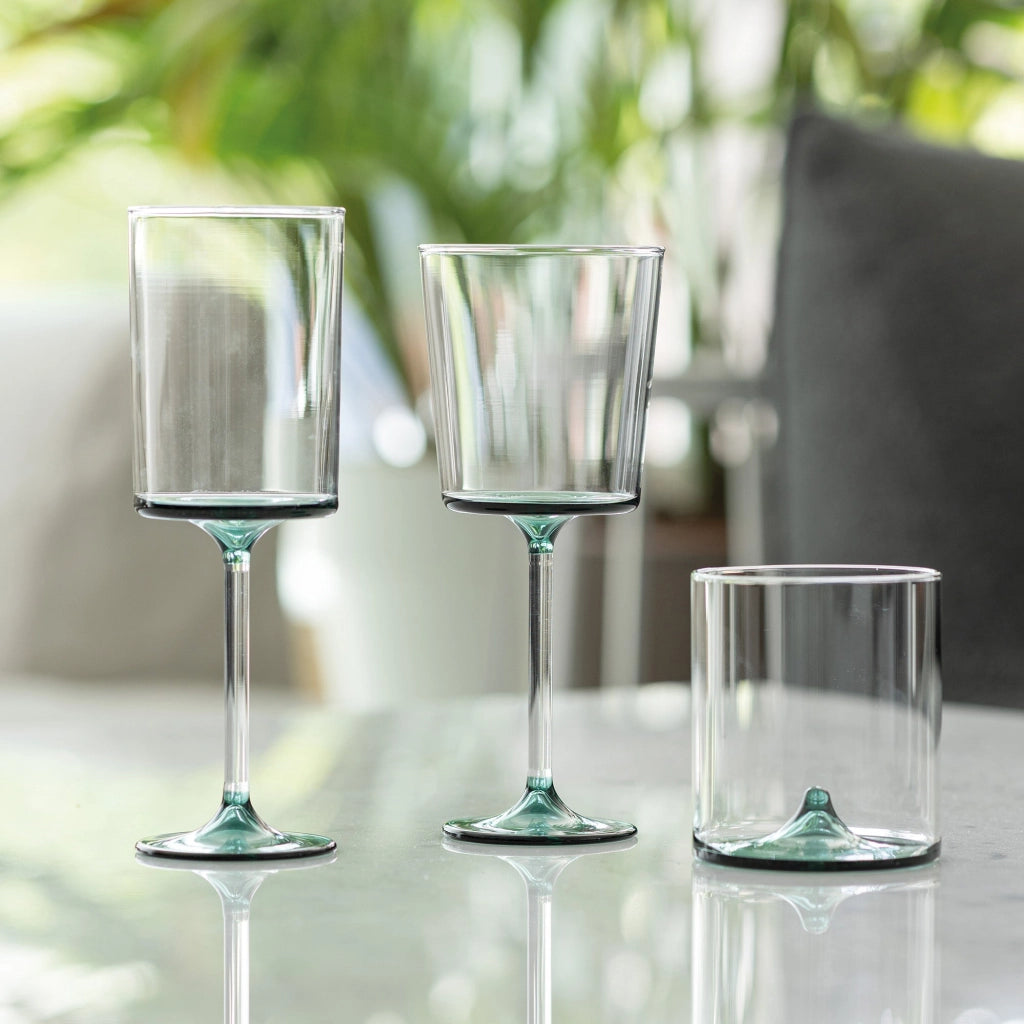 Set di 4 Tumbler Discobolo in Vetro Borosilicato Soffiato a Mano, Capacità 34,5 cl, Design Trasparente con Fondello Verde Lago per Tavole Raffinate