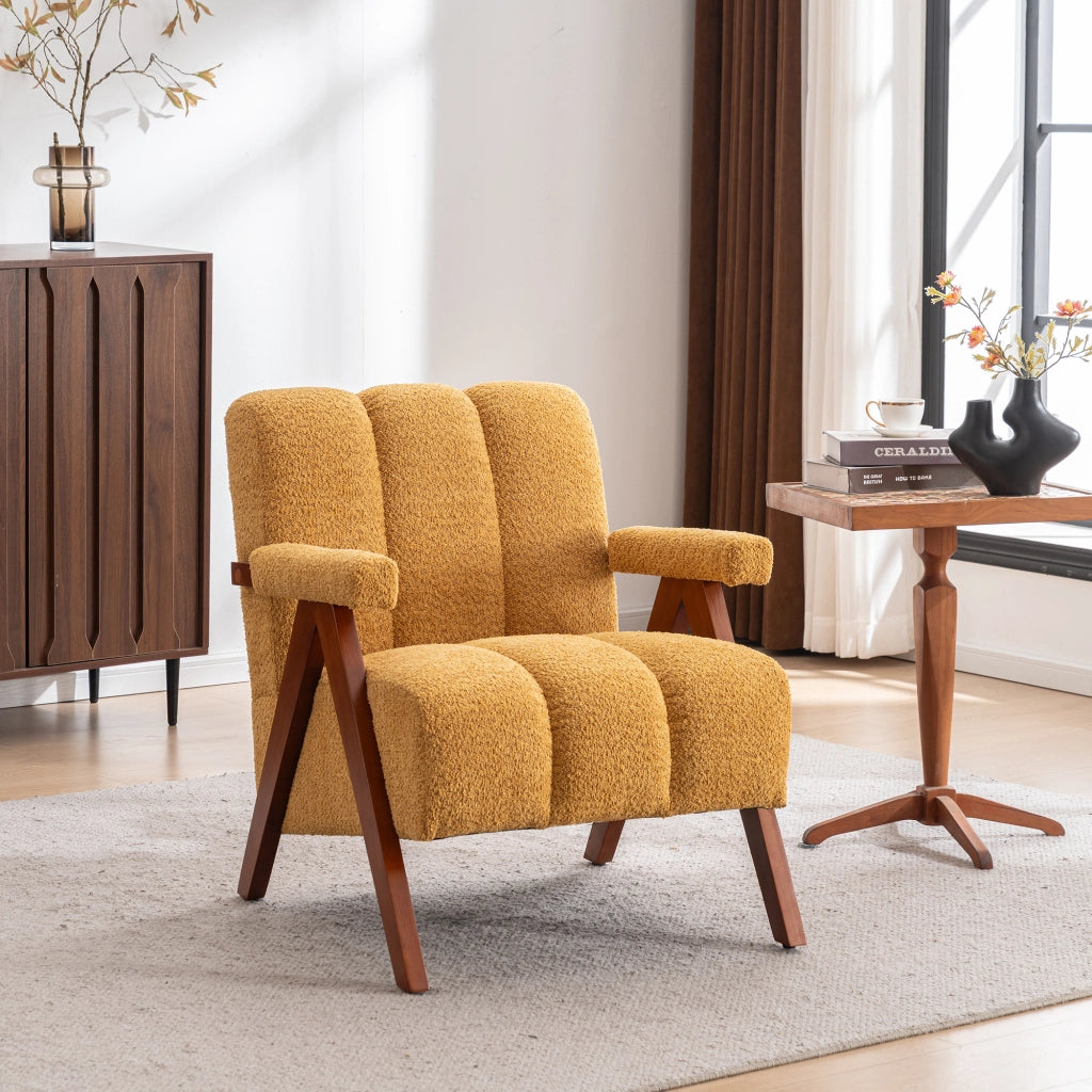 Poltrona con braccioli stile moderno e seduta imbottita per soggiorno in bouclé con struttura in legno giallo
