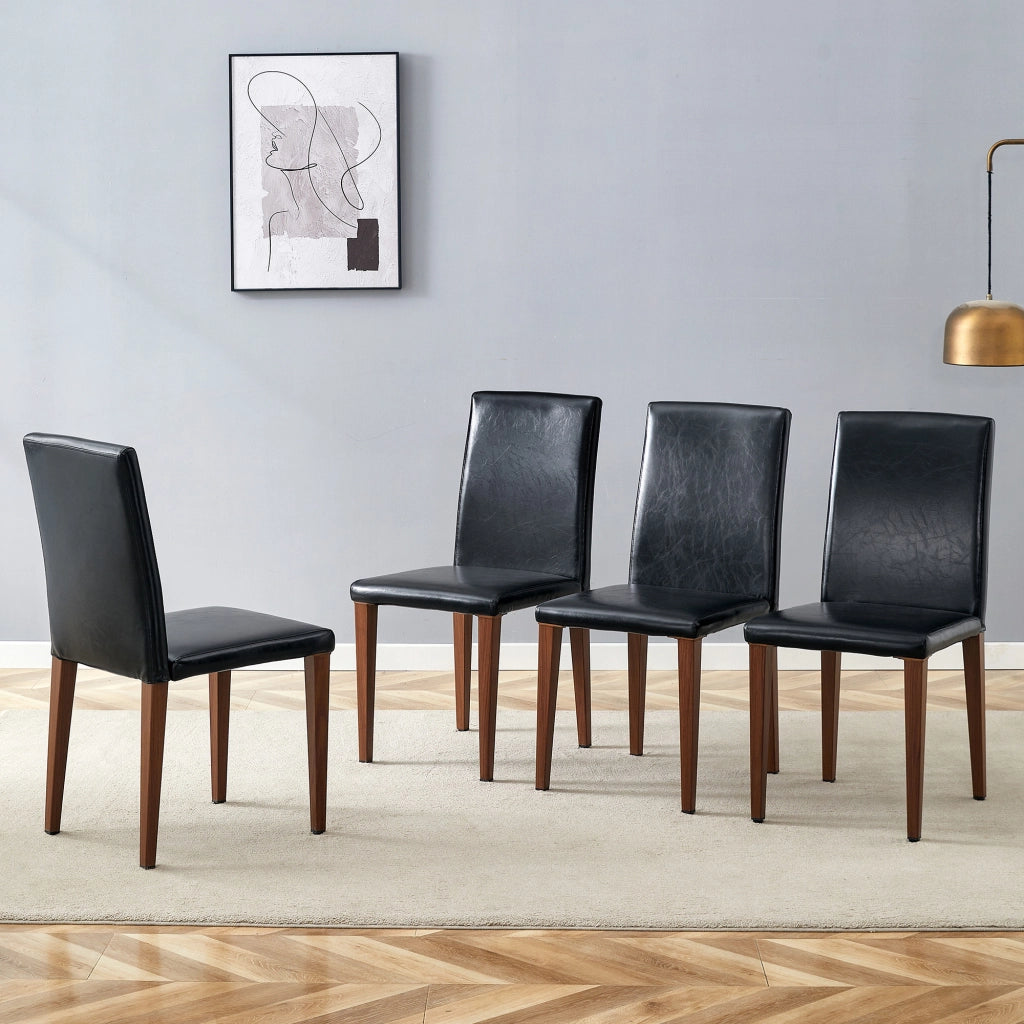 Set 4 sedie da pranzo moderne in PU nero con gambe in metallo effetto noce
