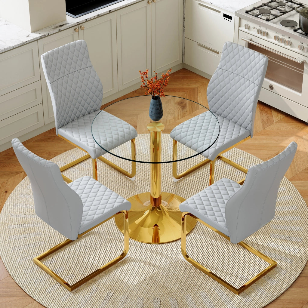 Set tavolo e sedie con 1 tavolo rotondo e 4 sedie; schienale ergonomico; in vetro e metallo oro; PU grigio chiaro