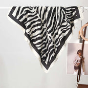 Eleganti e trendy sciarpe di seta da donna, realizzate in pura seta.