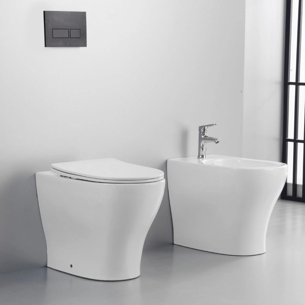 Coppia sanitari fun a pavimento vaso e bidet sedile frizionato