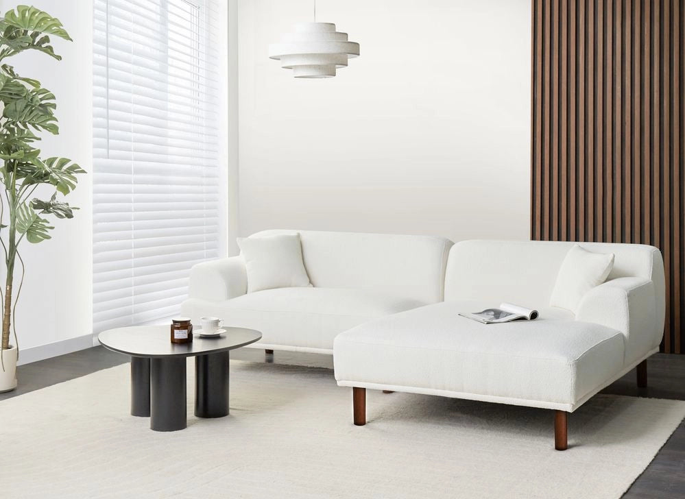Divano ad angolo sinistro in tessuto bianco lato sinistro stile minimalista