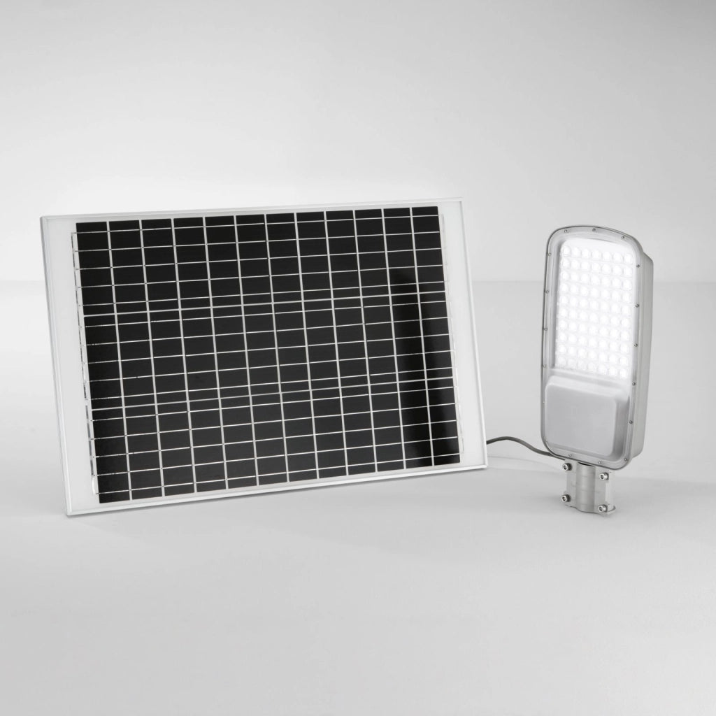 FARO SOLARE STRADALE LED RADIUS SILVER 64W 4200LM 3000K CON PANNELLO SOLARE IP65 48,6X8,7X20,7CM
