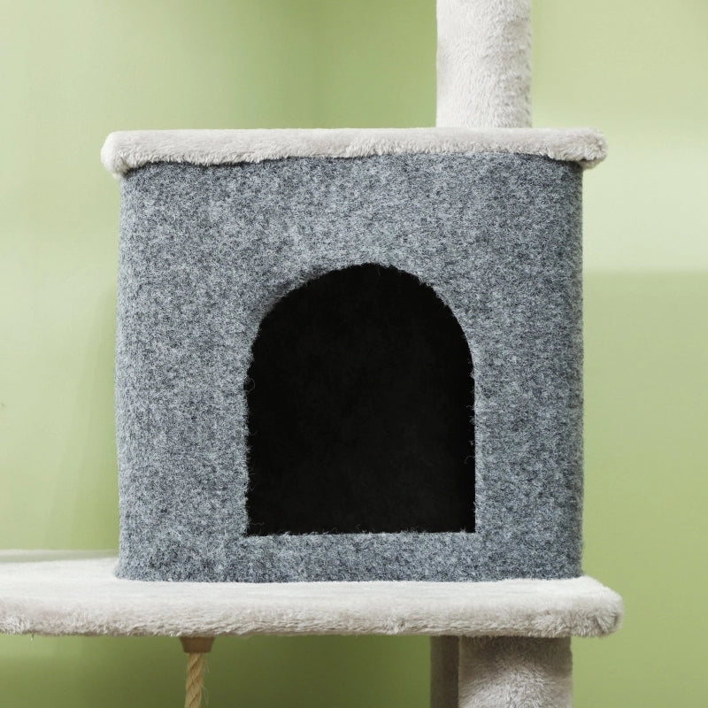 Tiragraffi per gatti da 132 cm con pali per graffiare, cuccia, casetta, piattaforme per saltare e spazzola per la toelettatura, colore grigio chiaro.