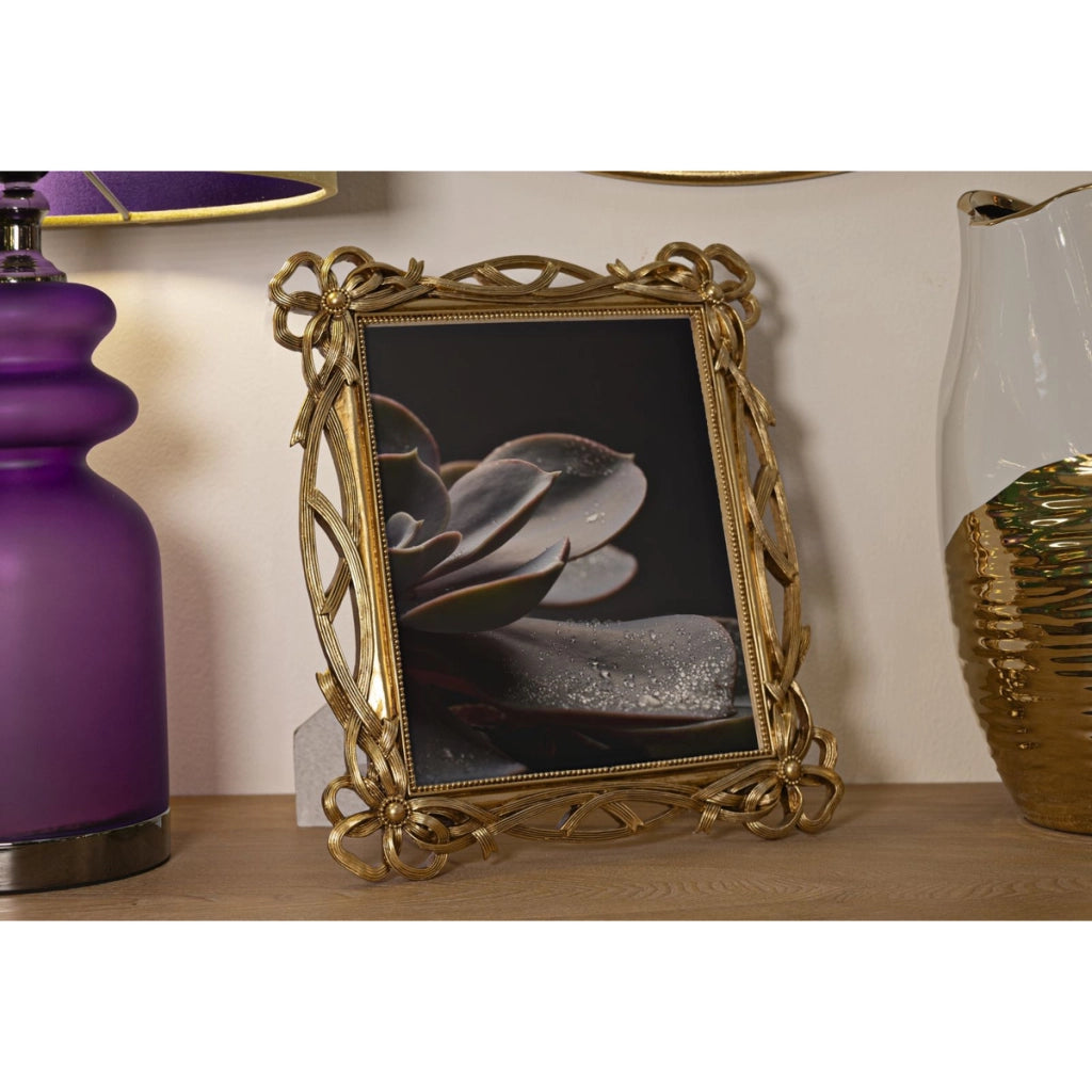 Cornice portafoto Knot oro con decoro a nodi 20x25 cm