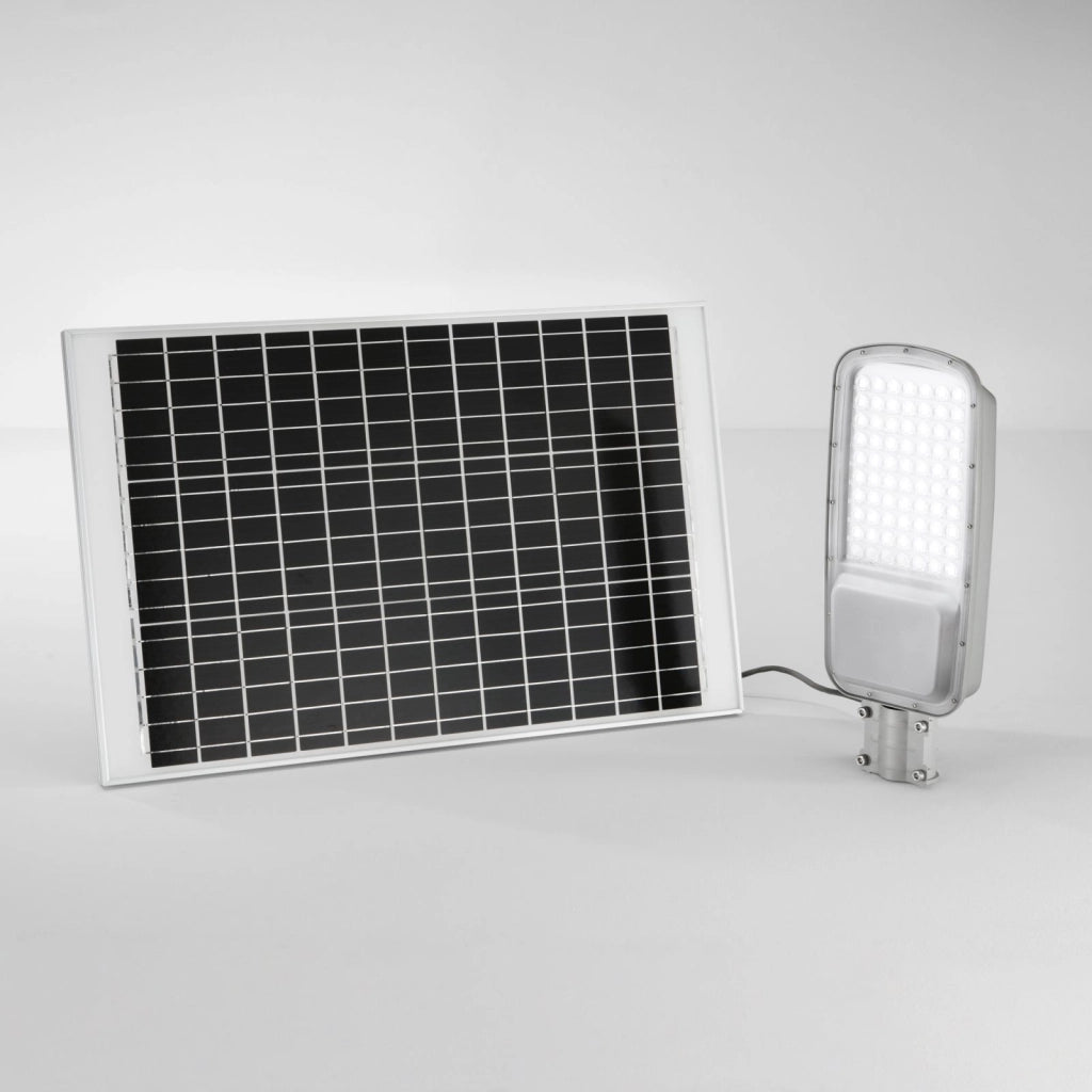 FARO SOLARE STRADALE LED RADIUS SILVER 64W 4200LM 3000K CON PANNELLO SOLARE IP65 48,6X8,7X20,7CM