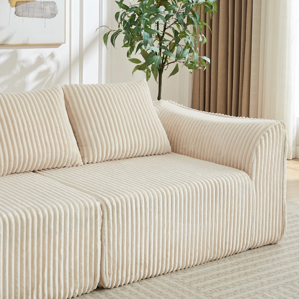 Divano modulare senza montaggio con linee curve e cuscini in velluto a coste beige 235 cm