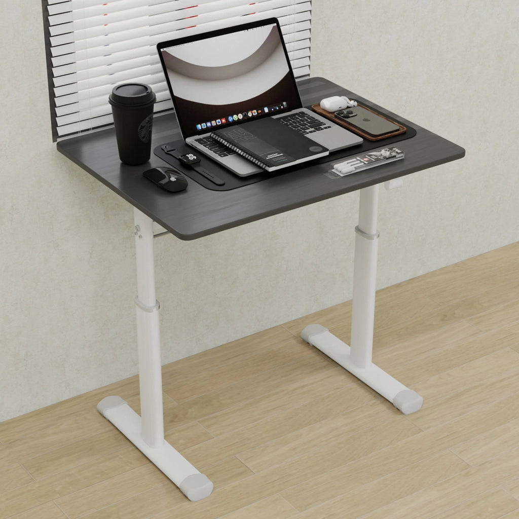 Scrivania regolabile in altezza manualmente, design compatto grigio, struttura in metallo e legno