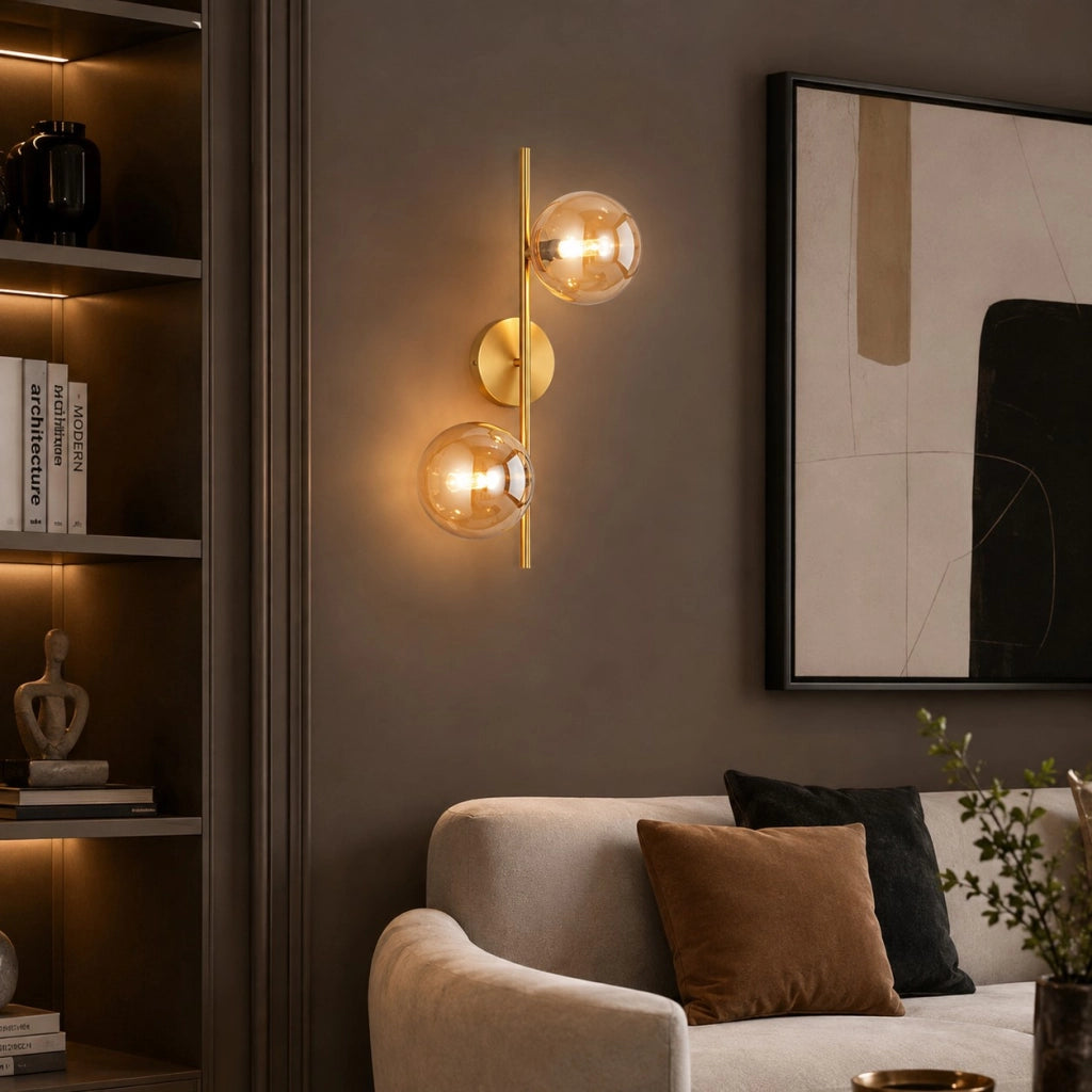 Applique lampada da parete finitura oro con 2 sfere trasparenti colore ambra doppio attacco lampadine G9