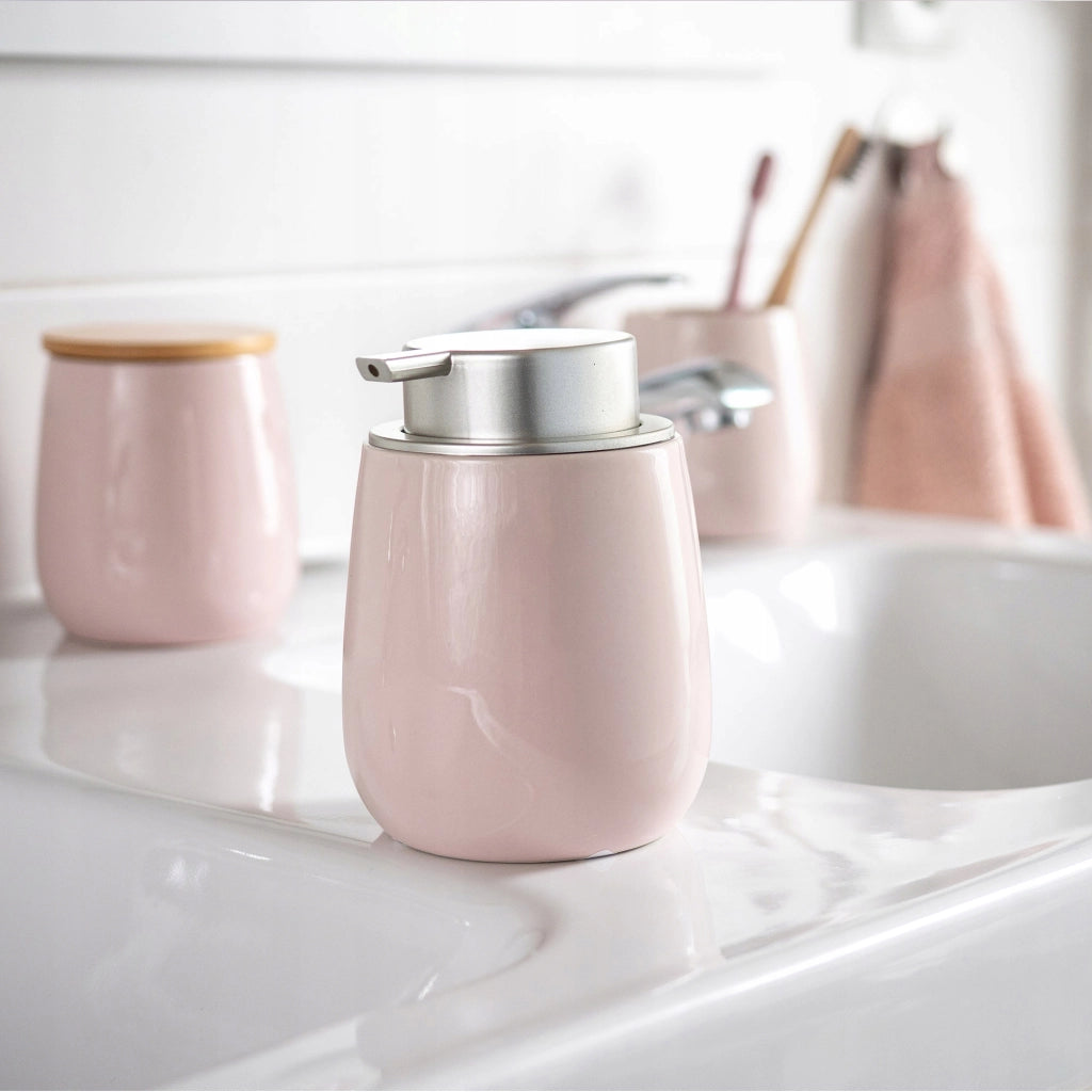Dispenser di sapone liquido KADAX, contenitore da 400 ml in ceramica rosa.