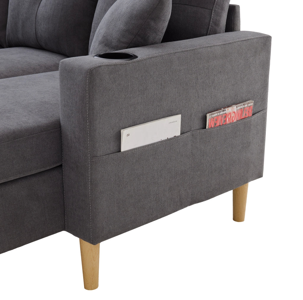 Divano angolare con chaise longue reversibile; contenitore; porta bicchieri e 2 cuscini; 175 cm; grigio scuro