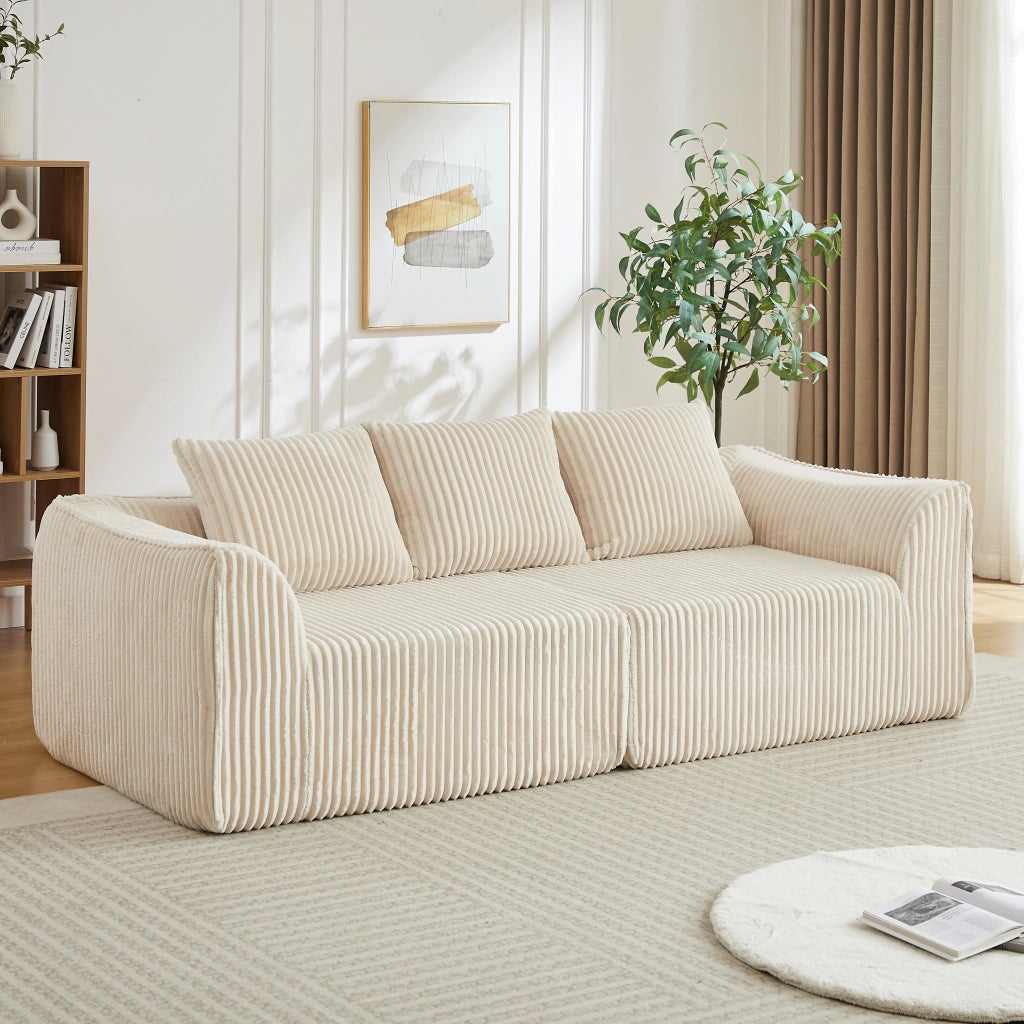 Divano modulare senza montaggio con linee curve e cuscini in velluto a coste beige 235 cm