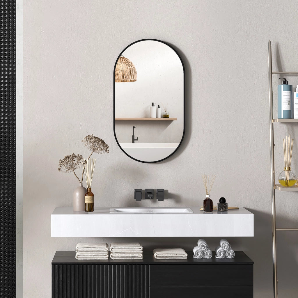 Specchio ovale da parete ¨C Xylo ¨C cornice in alluminio nero 40x70 cm
