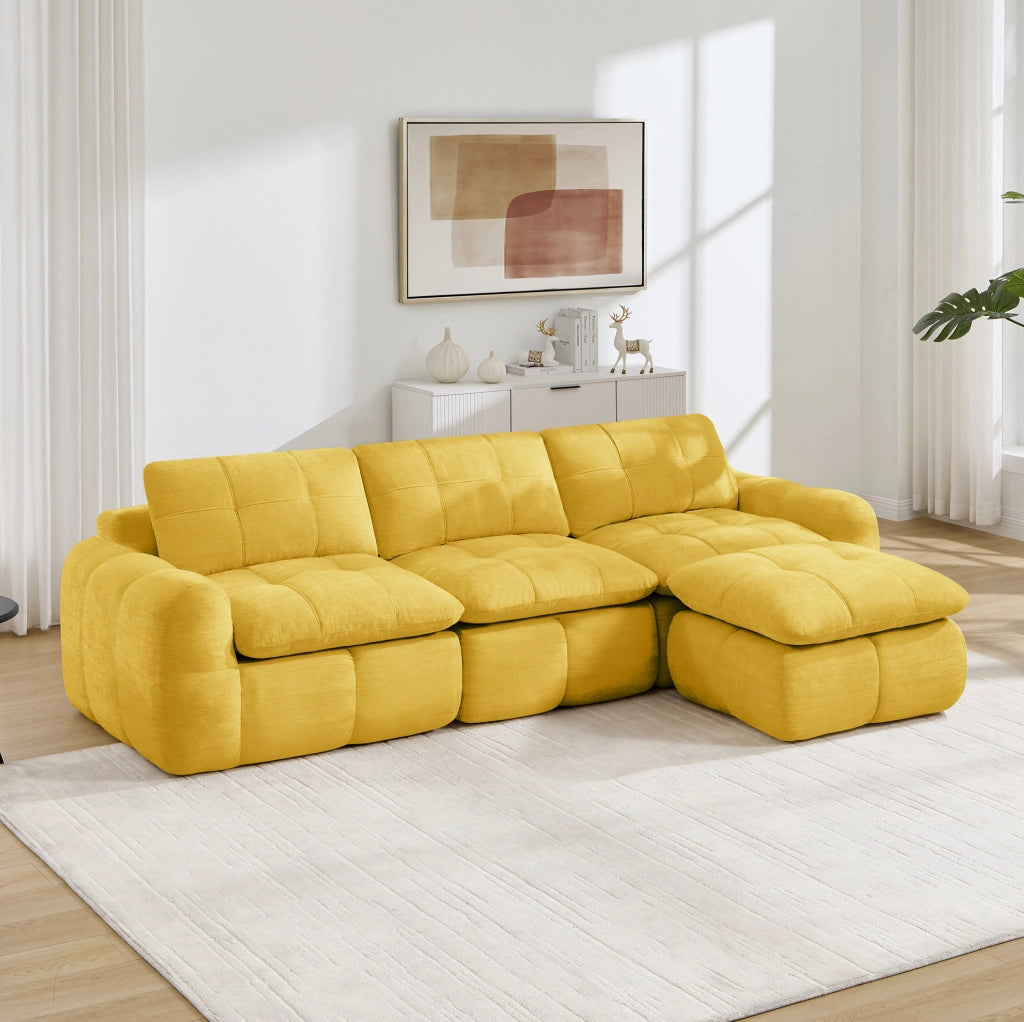 Divano modulare angolare a 3 posti con pouf 264x160x68 cm in chenille gialla