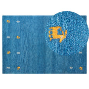 Tappeto Gabbeh in lana blu 140 x 200 cm, trapuntato a mano con motivi animali occidentali e design rustico