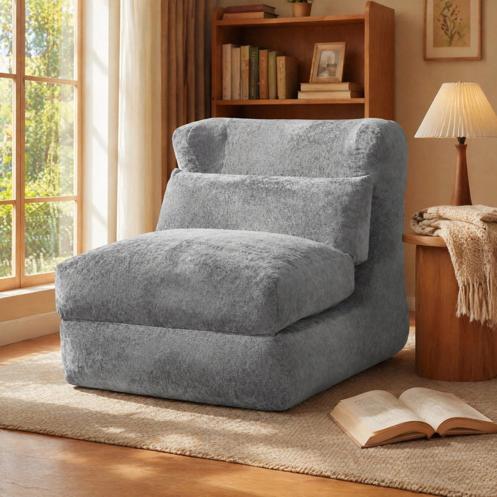 Poltrona componibile senza struttura in foam grigio, design moderno e uso versatile per soggiorno e camera da letto