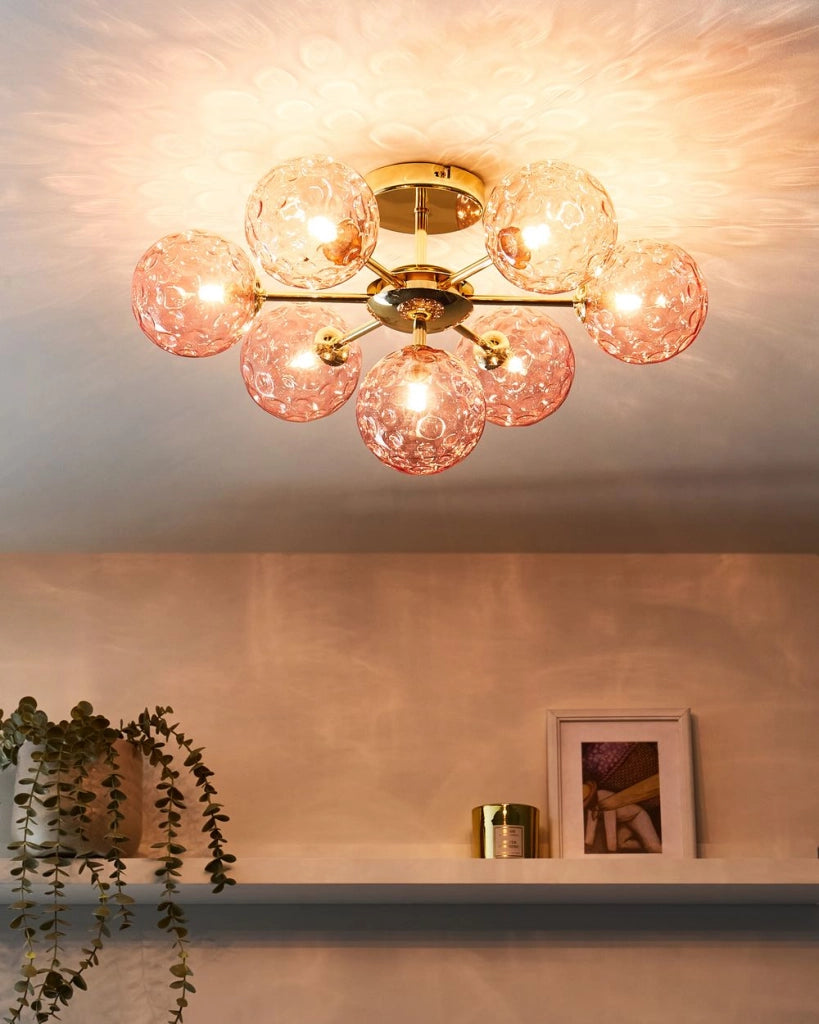 Lampadario in vetro 7 luci rotonde rosa metallizzato stile moderno