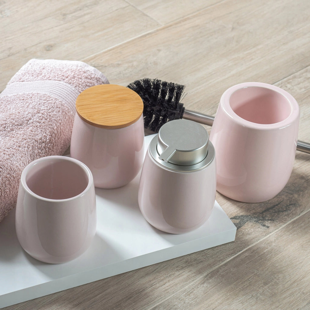 Dispenser di sapone liquido KADAX, contenitore da 400 ml in ceramica rosa.